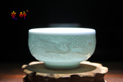 影青釉浮雕《凤》纹普洱杯