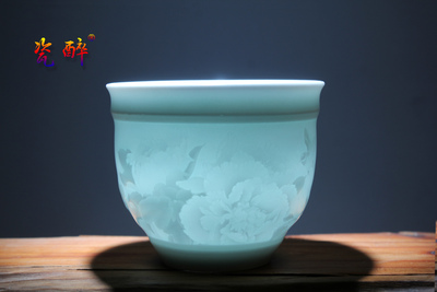 影青釉浮雕《国色天香》纹主人杯